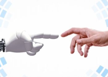 Dedos humano y robot